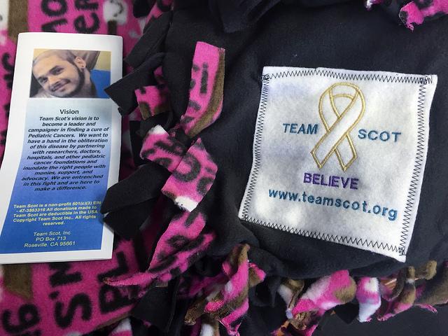 Team Scot is a non-profit organization with the goal of spreading awareness to a rare form of cancer, rhabdomyosarcoma. The charity was started after Scot Sieczko died and the organization goes around to hospitals and passes around blankets with a Team Scot patch on it to help make children going through cancer happier. (Photo by Joseph Daniels)