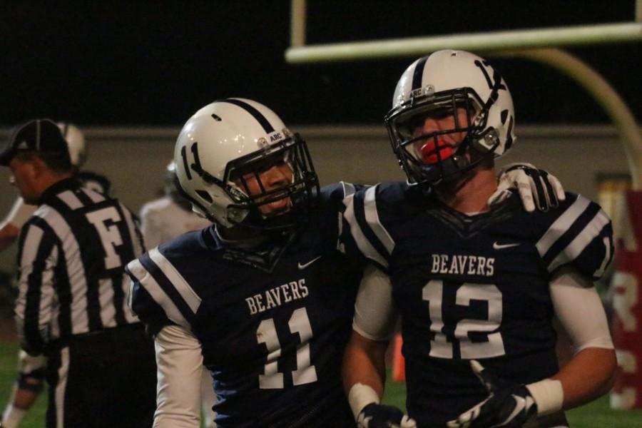 American River College wide receivers Zack Suarez, left, and Jonathan Lopez celebrate Lopez’s touchdown in the first quarter during ARC’s 38-18 win over Sacramento City College on Saturday, Nov. 14, 2015. (Photo by Barbara Harvey)