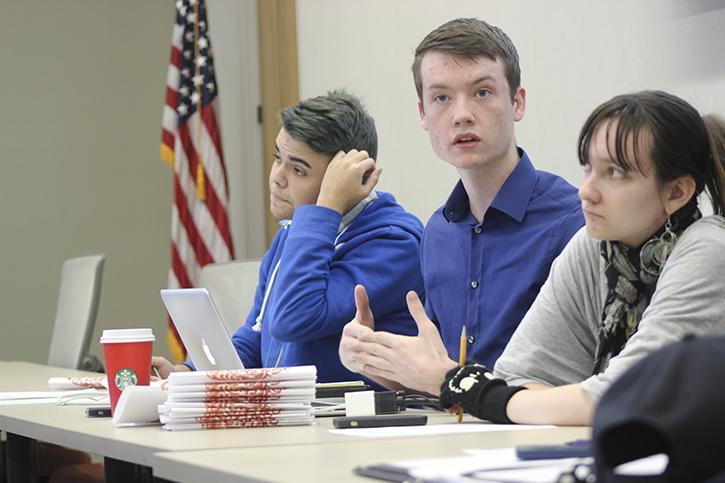 Clubs and Events Board President Justin Nicholson, center, discusses a resolution to create a survey to poll the ARC population on campus accessibility at the boards meeting on Tuesday. 
(Photo by Jordan Schauberger)