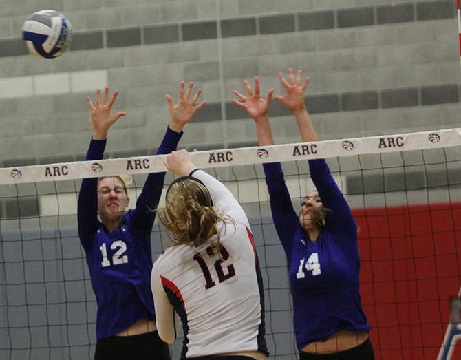 American River College middle blocker Erin Fogarty(12), returns a serve in ARCs 3-0 win against Modesto Junior College on Nov. 11, 2015. With the win, ARCs win streak increased to three in a row and its record now stands at 19-7. (Photo by Kevin Sheridan)