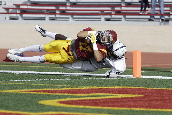 Former ARC linebacker Lawerence Hall stops a Sacramento City College player from scoring a touchdown during last seasons game on Nov. 15, 2014. ARC won the game 44-23 and must win the game Saturday to have any chance of making the playoffs. (File Photo)