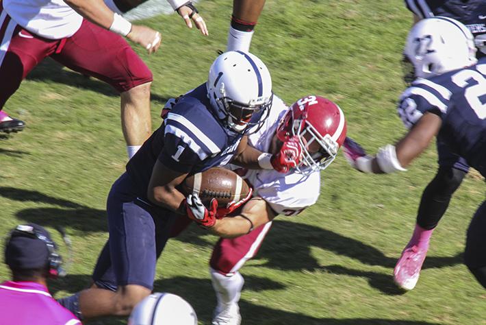 American River Colleges Khalil Hudson drives through a tackle from Sierra Colleges Andrew Lackowski during last Saturdays game at ARC. ARC plays Butte College this Saturday (Photo by Joe Padilla).