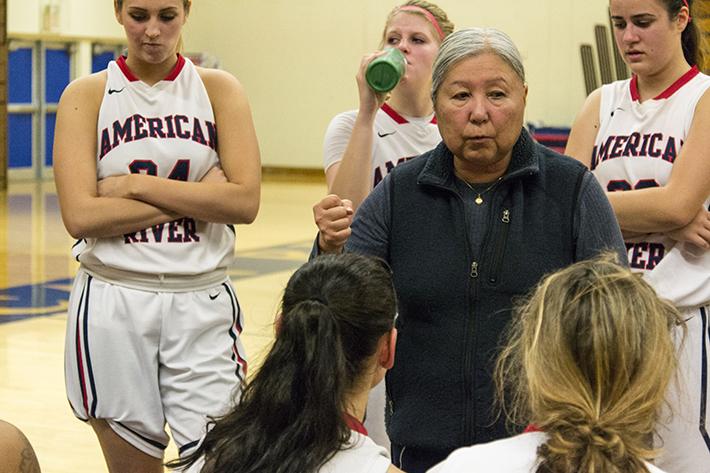 Head coach J.R. Matsunami gives the American River Colleges womens basketball team a pep talk in the second half of their game against Sierra College Friday. ARC lost to Sierra 71-56. 
(Photo by Joe Padilla)