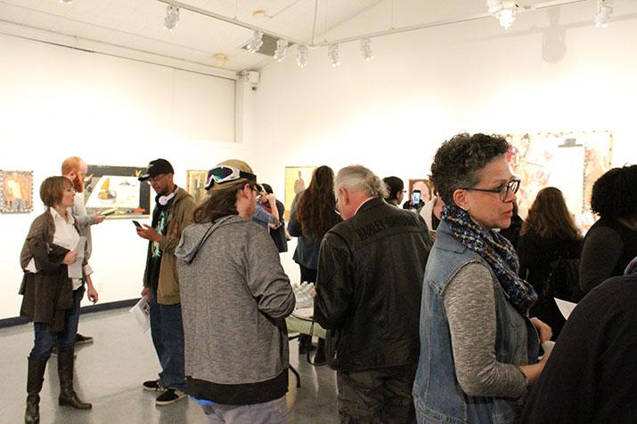 Students attend the Kaneko Gallery reception featuring Jack Ogden and his artwork on Thursday, which is on display at American River College in from Jan. 14 through Feb. 10. (Photo by Timon Barkley)