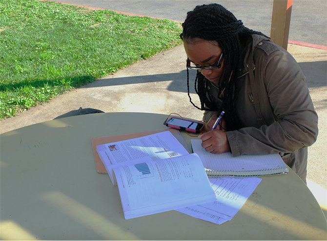 ARC student Destiny Perkins studies for her classes at the beginning of the semester. Many students have found new places to study away from the overcrowded Student Center and library. 
(Photo by Justina Sharp)