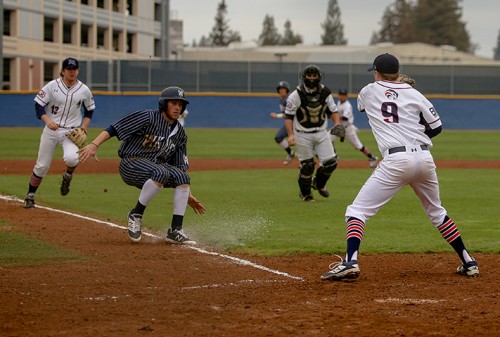 ARC pitcher BJ Marshall runs a West Valley base runner back to third base during a rundown in ARC's season opener hosting West Valley College at American River College in Sacramento Calif on Jan.28, 2016. ARC was defeated by West Valley with a final score of 7-6. (Photo by Kyle Elsasser)