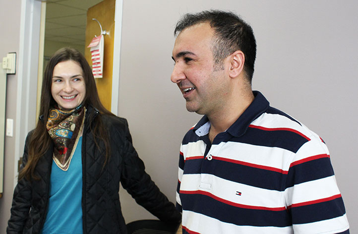 American River College students Anastasia Panfilova (left) and Mohammad Louayme (right) are student-workers for Parrot Voices, a project that tells the stories of ESL students. (Photo by Timon Barkley)