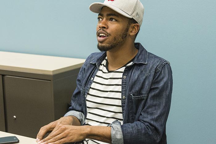 Julius Smith, a student at American River College speaks at the first Men of Color meeting Feb. 17. (Photo by Joe Padilla)