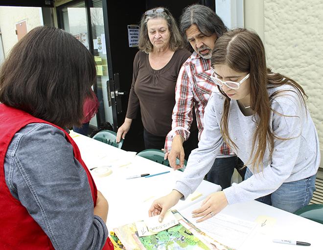  An ARC student submits her art to the Kaneko. Students will be submitting different forms of art in order to be selected for a spot in this years American River Review.(Photograph by Timon Barkley)