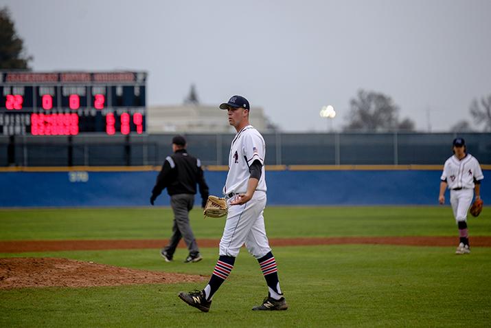 ARC pitcher Kurt Johnson questions a balk call made by the home plate umpire during a game vs West Valley. ARC was defeated by West Valley by the final score of 7-6. 1/28/16. (Photo by Kyle Elsasser)