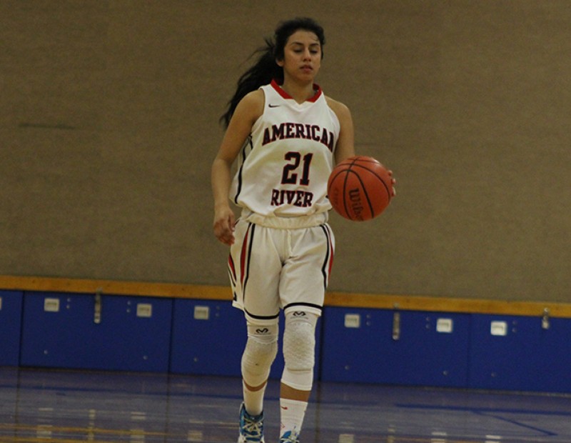 American River College guard Abigail Herrera brings the ball up-court during a playoff game against Skyline College on Wednesday Feb. 24, 2016. ARC lost 78-59. (Photo by Mack Ervin III)