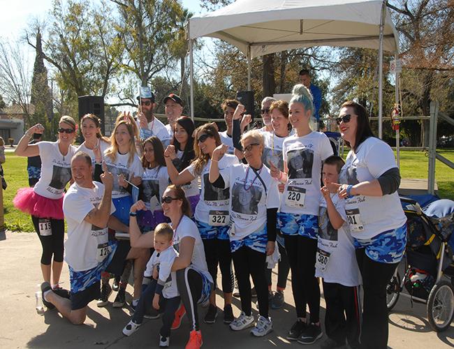 Participants pose for a photo after running the 5k Cancer Undy Run at William Land Park on Feb. 27, 2016. Colon cancer is the second leading cause of cancer deaths in the US. (Photo by Joe Padilla)
