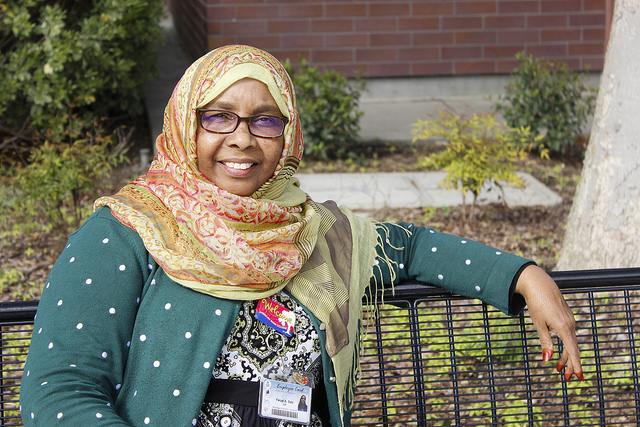 Director of the Student Services Resources Center, Faryal Said, sits on a bench outside of the Student Services building at American River College on Mar. 14, 2016.  (Photo by Hannah Darden)