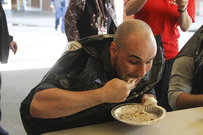 Garey Hollenbeck, Math Club President at American River College participated in the pie eating and won on March 14, 2016.  (Photo by Bailey Carpenter)