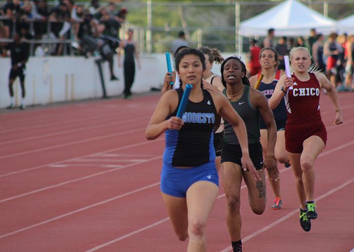 Modesto Junior College runner Mariajose Correa leads the pack during the 2nd leg of the womens 4x400m relay race at the American River Invitational on March 26, 2016 at American River College. Correa and the Modesto team finished 3rd with a time of 4:00.84. (Photo by Mack Ervin III)