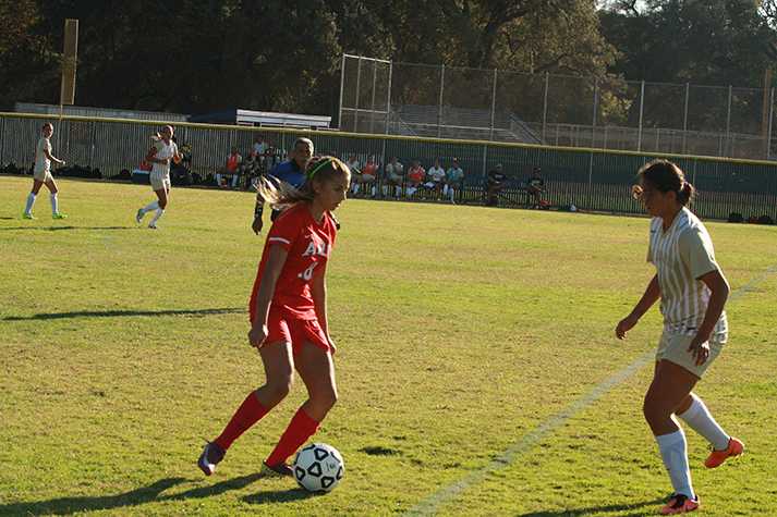 Former ARC soccer player McCall Madriago (left) was selected to the U.S. womens deaf national soccer team. Madriago scored 2 goals for ARC in 2014. (File Photo)