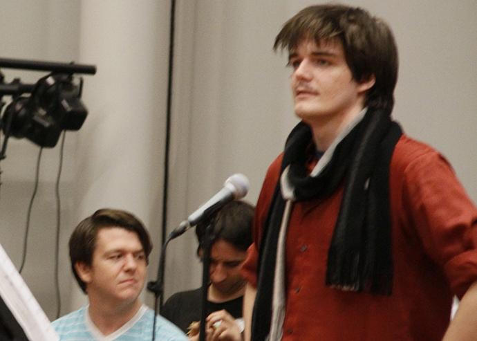 Actor and former ARC student Christian Brian Hirtzel (standing right) rehearsing for ARCs production of Young Frankenstein. Hirtzel was found guilty on four counts relating to sexual extortion and will be sentenced on August 2. (File Photo)