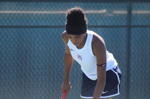 American River College's Kiana Brown prepares to serve during a doubles match against Santa Rosa Junior College on March 16, 2016 at ARC. Brown and her teammate Addie Ramos lost the match. (Photo by Mack Ervin III)