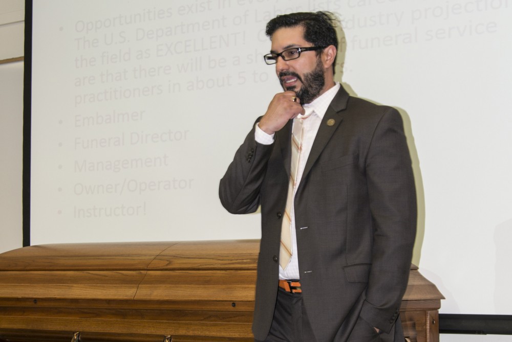 Professor Damon Dela-Cruz of Sacramentos East Lawn Mortuary spoke on April 7 at Raef Hall during a college hour.  (Photo by Joe Padilla)