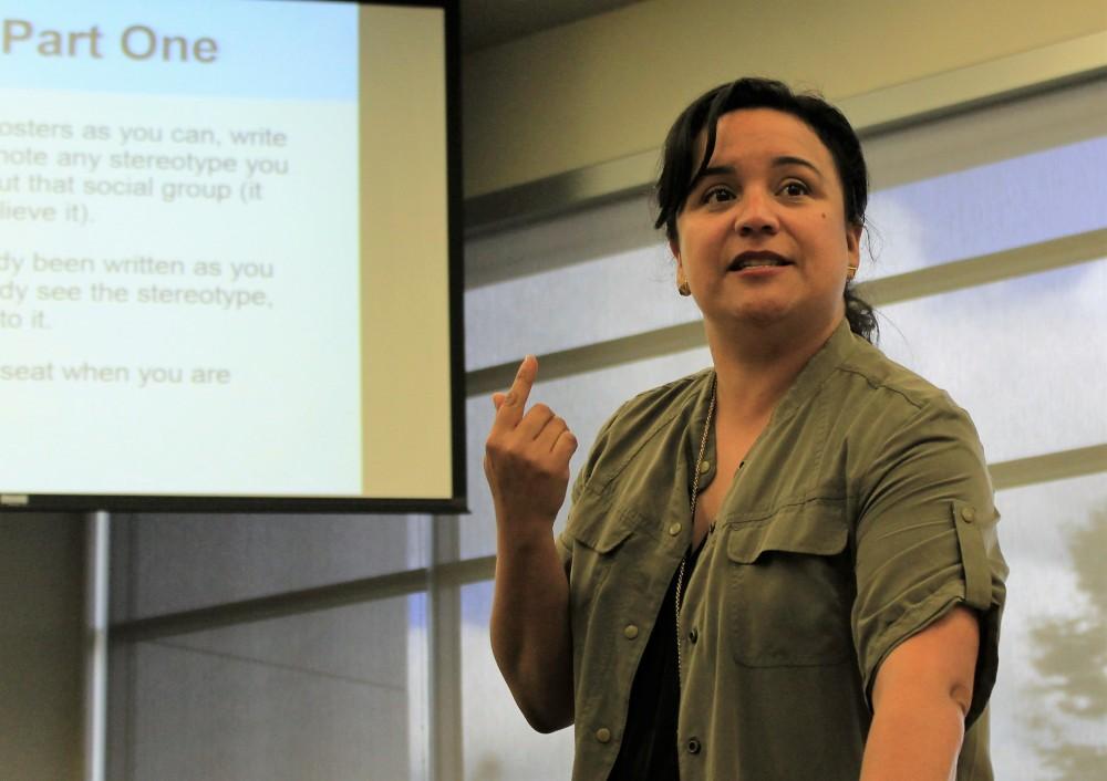 Professor Alina Cervantes spoke to ARC students about stereotypes viewed in society on April 14.  (Photo by Nicole Kesler)