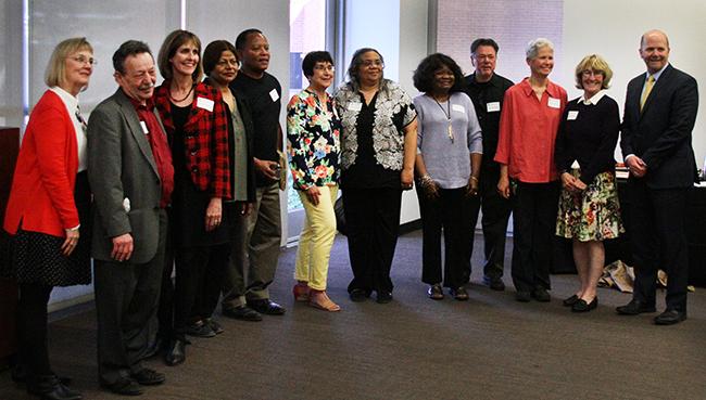 All the attending retirees of the American River College retitrement reception pose for a group photo with ARC president Greene on March 31. (Photo by Matthew Nobert)