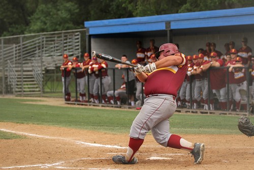 Sacramento City first baseman Tim Hall hits a grand slam during a game vs. American River College on April 21 2016 at American River College. ARC lost by the final score of 7-3. (Photo by Kyle Elsasser)