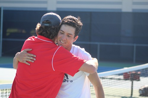 American River College men's tennis coach Bo Jabery-Madison hugs Seppi Capaul after his match against Jacob Strabo of Foothill College on April 16, 2016 at ARC. Capaul won his match 6-3, 6-1 to make ARC NorCal Champions. (Photo by Mack Ervin III)