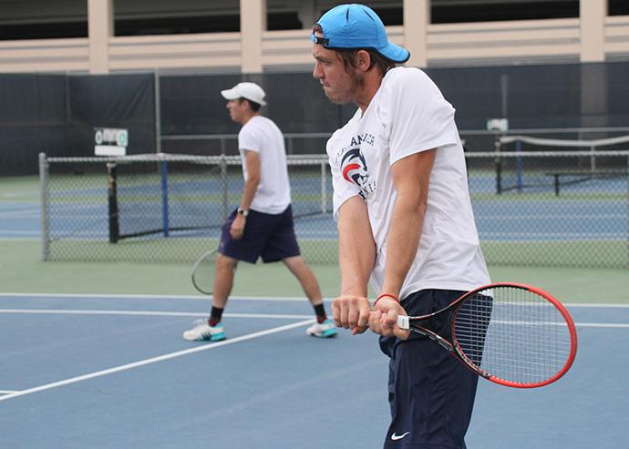 American River College mens tennis players Alex Meliuk (front) and Seppi Capaul (back) play a doubles match during the NorCal Semifinals against Chabot on April 12, 2016. ARC won the match 5-0 and moved on to the next round of playoffs. (Photo by Matthew Nobert)