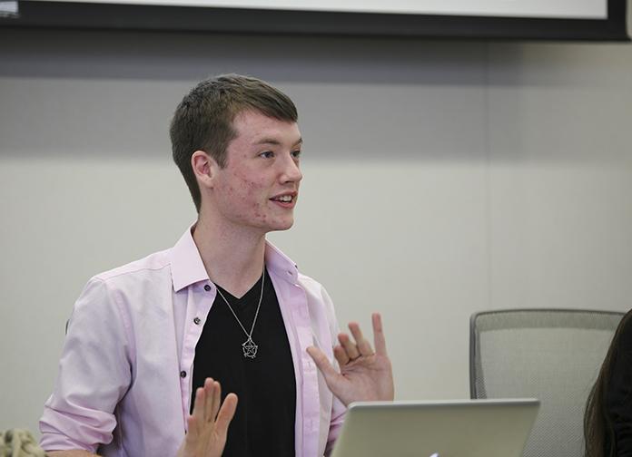 CAEB president Justin Nicholson discusses the agenda for the boards meeting Tuesday. CAEB discussed how  it could improve for upcoming year as well as plans for an end-of-the-year celebration. (Photo by Kyle Elsasser)
