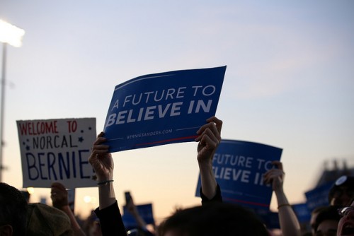 A member of the audience holds a sign that reads 'A Future To Believe In' during Bernie Sanders rally at Bonney Field in Sacramento, California on May 9, 2016. The rally drew a crowd of approximately 15,000 people. (Photo by Kyle Elsasser)