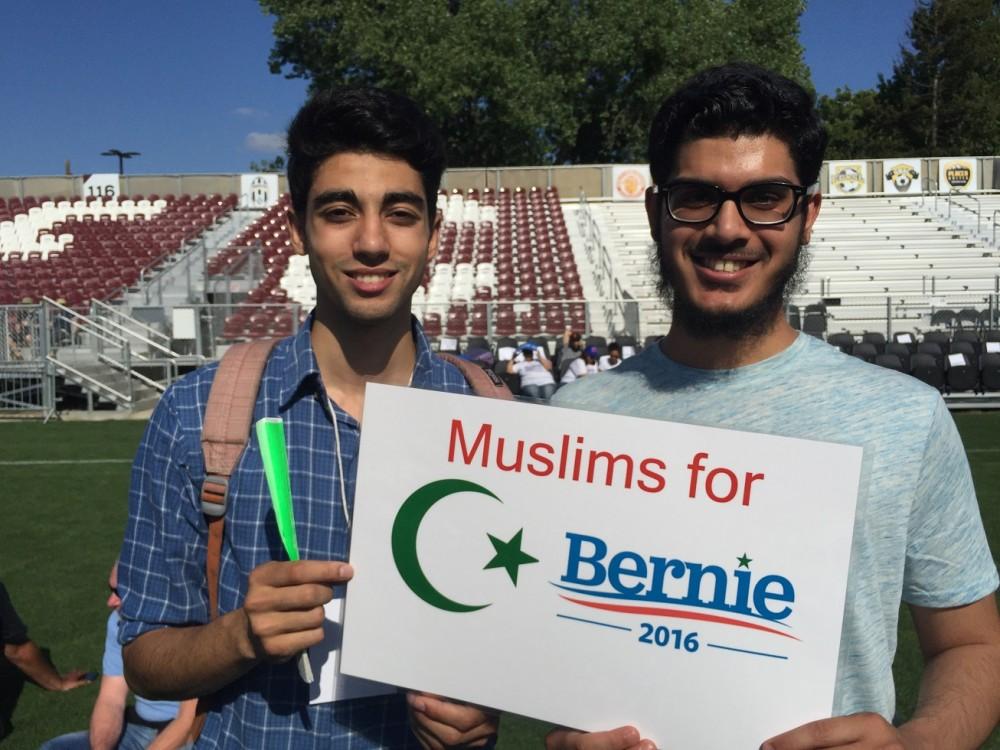 American+River+College+students+Omar+Mahmi+%28left%29+and+Tulaib+Zafir+%28right%29+hold+up+a+Muslims+for+Bernie+sign+at+the+Bernie+Sanders+in+Sacramento.+Zafir+said%2C+Bernie+is+our+only+hope.%0A%28Photo+by+Jordan+Schauberger%29