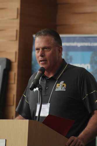 Denver Broncos offensive line coach Clancy Barone gives the keynote speech during a Linemen Win Games (LWG) coaches clinic on May 21, 2016 at American River College. Barone was part of the Broncos team that won Super Bowl 50 over the Carolina Panthers 24-10. (Photo by Mack Ervin III)