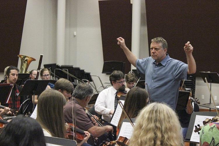 Orchestra+Director+Steven+Thompson+conducts+the+American+River+College+Orchestra.+The+ARC+Orchestra+will+hold+a+Star+Wars+themed+concert+on+May+4.+%28File+Photo%29