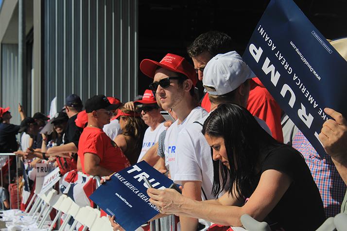 Supporters of Donald Trump stand in line and wait for a rally event in Sacramento, California on June 1, 2016. (Photo by Jordan Schauberger)