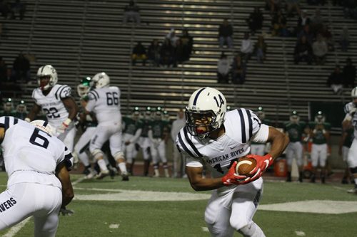American River College wide reciever Daliceo Calloway catches the ball and runs during a game against Diablo Valley College on Friday Sep. 1 at DVC. Calloway made the game winning touchdown reception with 47 seconds remaining as ARC won 23-20. (Photo by Lao Broadway)