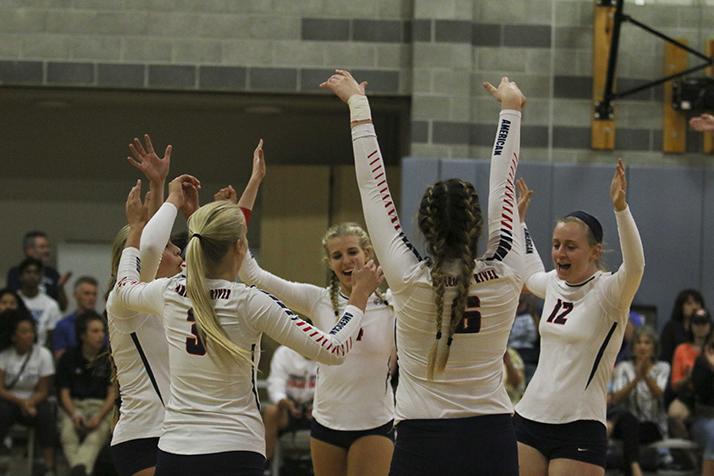 ARC’s womens volleyball team celebrates after they make another score against SRJC on Sept. 24. ARC won 3-0. (Photo by Laodicea Broadway)