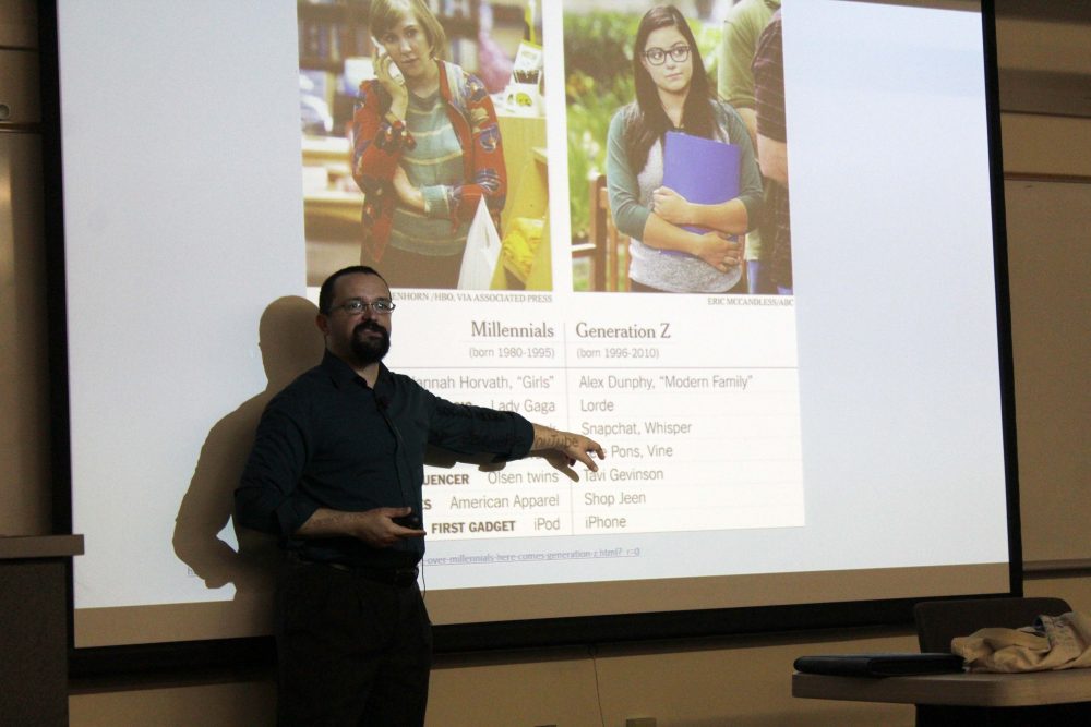 Carlos Reyes, Dean of behavioral & social science, discusses trends of millennial and generation y students at a College Hour in Raef Hall 160 on Sept, 20, 2016. (Photo by Robert Hansen)