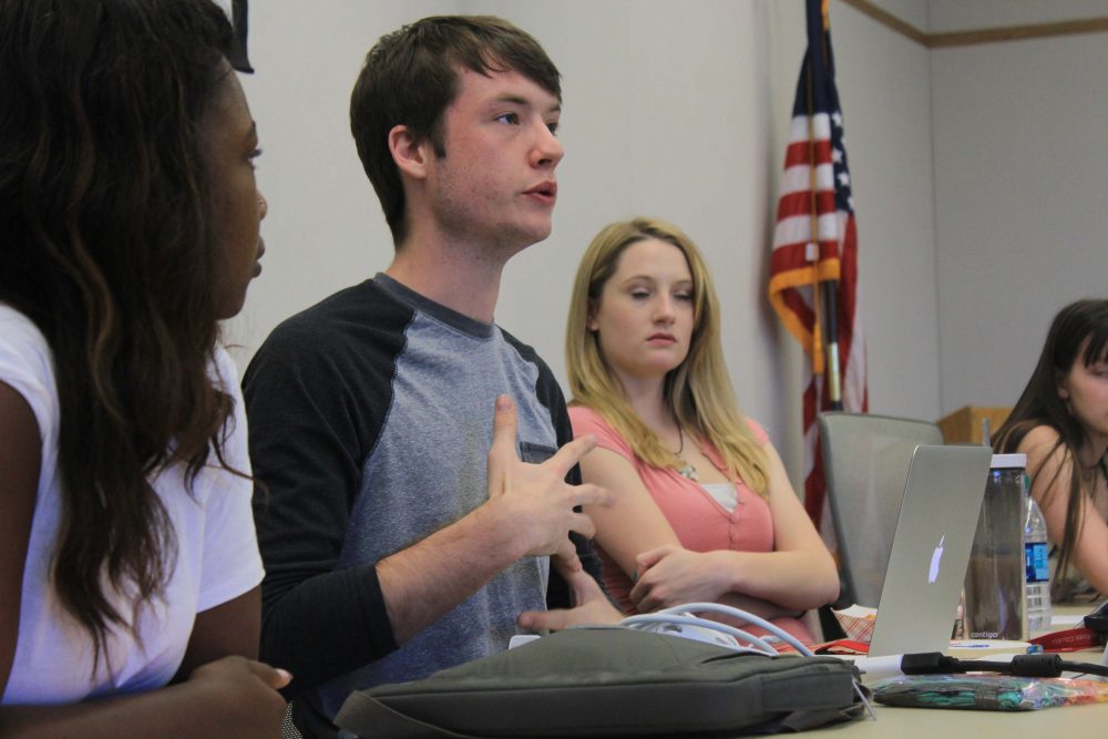 American River College Clubs and Events Board President Justin Nicholson (center) discussing  Club Day at an October meeting with Ashlee Nicholson (right) and Valencia Scott (left) in the Board room. (File Photo)