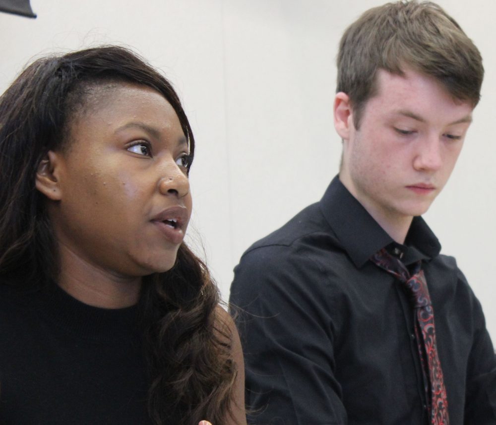 Senate President Valencia Scott (left) discusses the fomation of the judiciary committee as Justin Nicholson listens and Laurie Jones waits to be called on at the first senate meeting of the semester on Sept. 1.  (Photo by Robert Hansen)