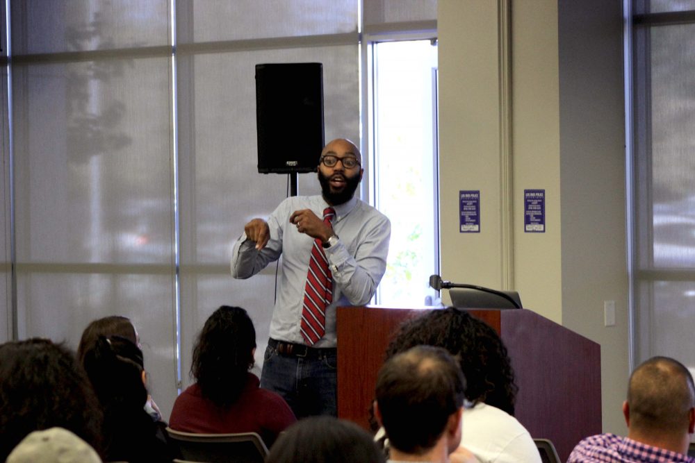 Dr. Christopher Emdin speaking about Science, Technology, Engineering, Mathematics (STEM), and Hip-Hop fusion in the community rooms, Thursday, Oct. 20. Many students showed up to listen to Dr. Emdin relate learning to Hip-Hop culture.
