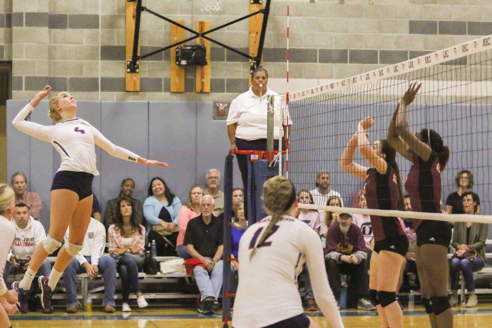 Outside Hitter Dani Schoen gets ready to spike the ball during the Dig Pink game against Sacramento City College on Oct. 19. Arc lost 3-1. (Photo by Laodicea Broadway)