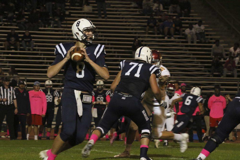 Quarterback Griffin Dahn drops back for a pass during the Beavers 17-7 victory over Sacramneto City College on Oct. 22. (Photo by Laodicea Broadway)