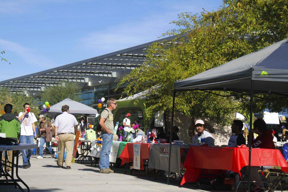 Student browse booths during Monster Mash Club Day on Oct. 20 at American River College. (Photo by Leo Broadway)