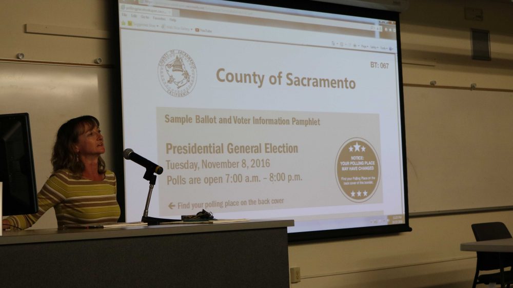 Tressa Tabares shows her sample ballot for the upcoming Nov. 8 election in Raef Hall on Oct. 27, 2016. (photo by: Cierra Quintana)