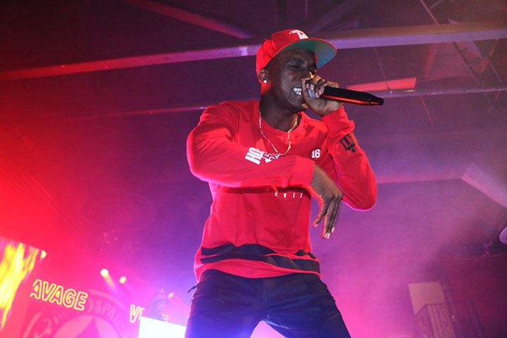 Hopsin performs on stage for his tour “SavageVille,” at Ace of Spades in downtown Sacramento 1417 R St, on Sat. Oct. 8. The rapper demonstrated his spontaneity when he jumped off of the stage, and with the support of his fans, stood up and continued to rap. (Photo by Cheyenne Drury)