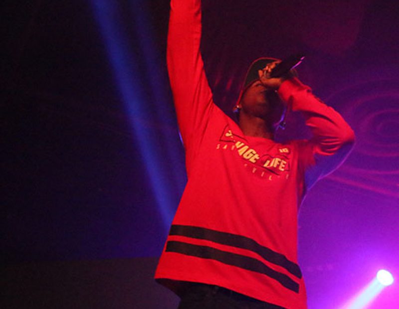 Hopsin performs on stage for his tour “SavageVille,” at Ace of Spades in downtown Sacramento 1417 R St, on Sat. Oct. 8. The rapper demonstrated his spontaneity when he jumped off of the stage, and with the support of his fans, stood up and continued to rap. (Photo by Cheyenne Drury)
