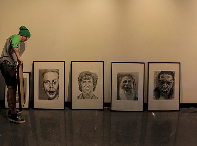 Artist Bia Allen arranges some of the pieces that will go up on display in the Shadow Box Gallery at American River College (Photos by Luis Gael Jimenez)