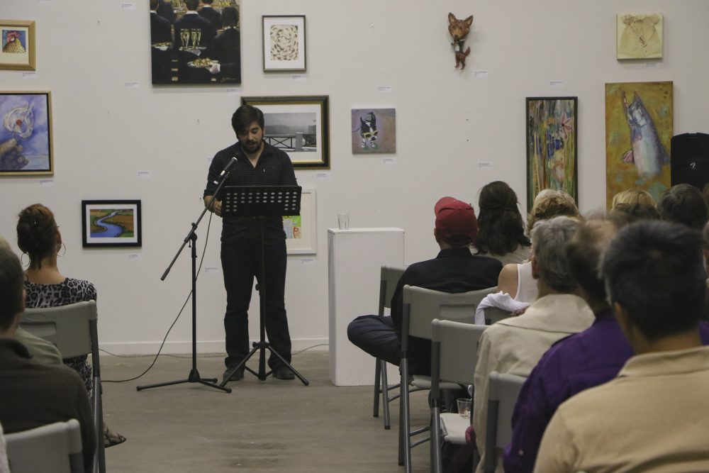 Local actor Pano Roditis reads from Rachel Gardner’s “Tradesman” at the Stories on Stage Los Rios night event on Sept. 30, 2016. The event honored the Los Rios creative writing programs with live readings of stories from each college’s literary magazine. (Photo by Hannah Darden)