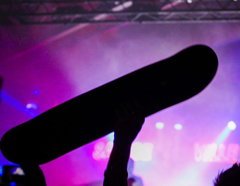 An audience member holds up a skateboard during a Hopsin performance during a show at Ace of Spades in Sacramento, California during his “SavageVille” tour (Photo by Luis Gael Jimenez)