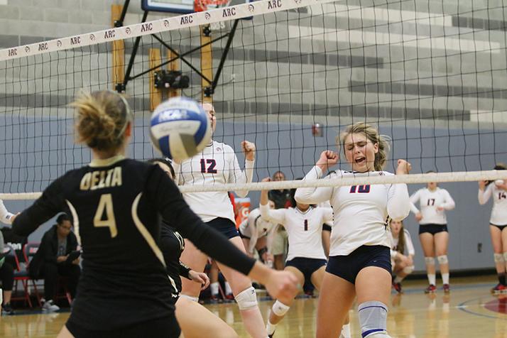 ARC vollyball players Erin Fogarty and Kaitlin Meyer rush for the ball during a game against San Joaquin Delta College on Nov. 9, 2016. (Photo by Lidya Grib)